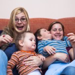 Two mums and children