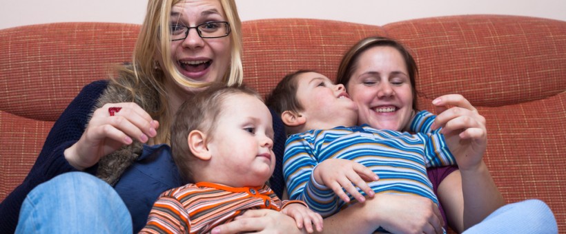 Two mums and children