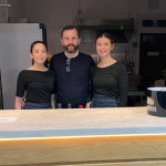 Chris Jennings, The Space Invader Pub owner, and his daughters.