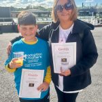 Lindsey and Jack Arrowsmith with their certificates for completing the walk