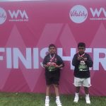 Job done - Arhaan and his brother complete the Vitality Westminster Mile